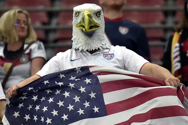 A supporter of the US team wears an American Eagle mask after the soccer friendly match between Germany and the United States in Cologne, western Germany, Wednesday, June 10, 2015. The US team defeated Germany by 2-1. (AP Photo/Martin Meissner)