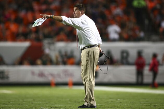 Miami  coach Al Golden watches game action against Pittsburgh  during the first half of a NCAA college football game in Miami Gardens, Fla., Saturday, Nov. 29, 2014. (AP Photo/J Pat Carter)