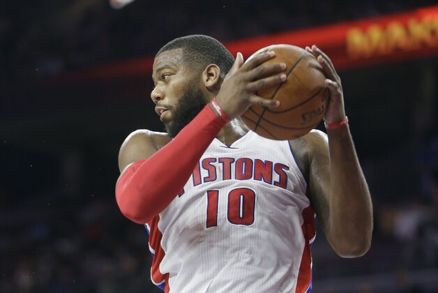 Detroit Pistons forward Greg Monroe pulls down a rebound during the second half of an NBA basketball game against the Los Angeles Lakers in Auburn Hills, Mich., Tuesday, Dec. 2, 2014. The Lakers defeated the Pistons 106-96. (AP Photo/Carlos Osorio)