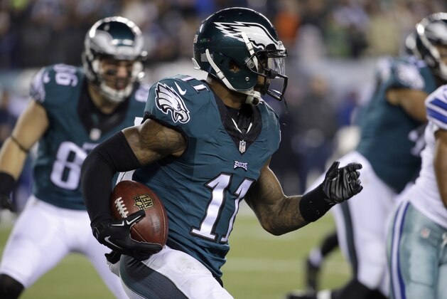 Philadelphia Eagles' Josh Huff catches a kick off during the first half of an NFL football game against the Dallas Cowboys, Sunday, Dec. 14, 2014, in Philadelphia. (AP Photo/Michael Perez)
