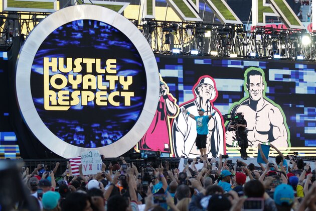 John Cena makes his entrance at Wrestlemania XXXI, on Sunday, March 29, 2015 in Santa Clara, CA. 2015 marks the first year Wrestlemania will be held in the San Francisco Bay Area, being made available to viewers in 177 countries via the WWE Network. (Don Feria/AP Images for WWE)