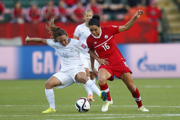 EDMONTON, AB - JUNE 11: Jonelle Filigno (R) of Canada and Annalie Longo of New Zealand battle for the ball during the FIFA Women's World Cup Canada Group A match between Canada and New Zealand at Commonwealth Stadium on June 11, 2015 in Edmonton, Alberta, Canada.  (Photo by Todd Korol/Getty Images)