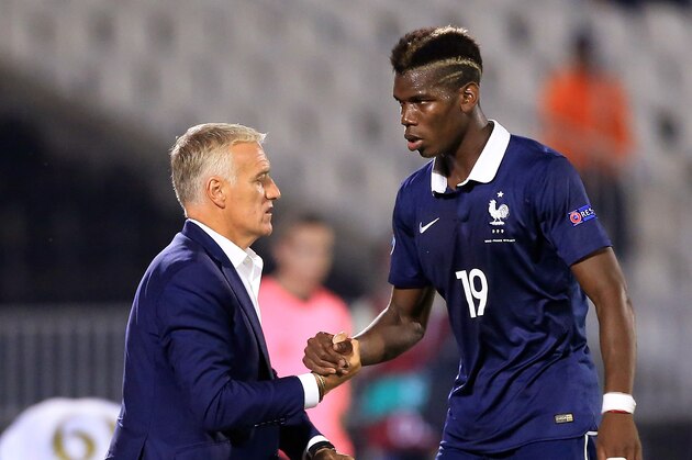 BELGRADE, SERBIA - SEPTEMBER 07: France's national football team head coach Didier Deschamps (L) shakes hand with player Paul Pogba (R) during the International friendly match between Serbia and France at the Stadium JNA on September 07, 2014 in Belgrade, Serbia, 2014. (Photo by Srdjan Stevanovic/Getty Images)