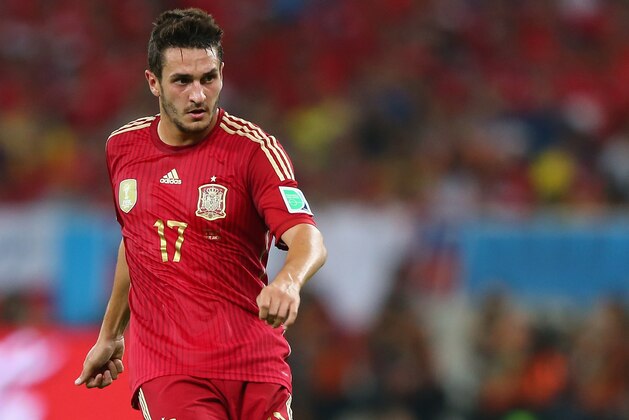 RIO DE JANEIRO, BRAZIL - JUNE 18: Koke of Spain controls the ball during the 2014 FIFA World Cup Brazil Group B match between Spain and Chile at Maracana on June 18, 2014 in Rio de Janeiro, Brazil.  (Photo by Jamie Squire/Getty Images)
