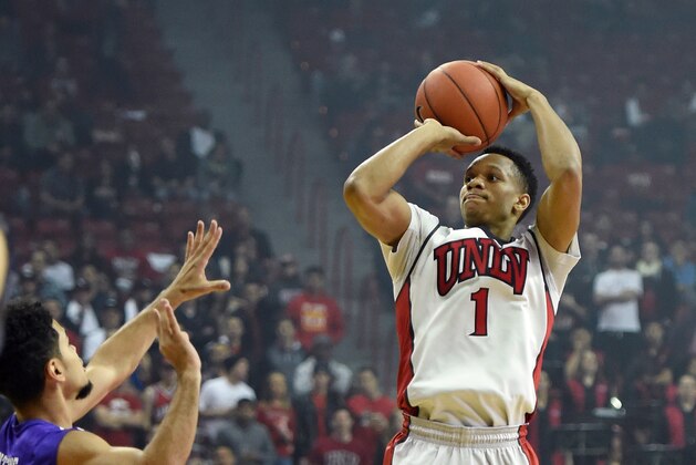 LAS VEGAS, NV - DECEMBER 17:  Rashad Vaughn #1 of the UNLV Rebels shoots against Portland Pilots during their game at the Thomas & Mack Center on December 17, 2014 in Las Vegas, Nevada. UNLV won 75-73 in overtime.  (Photo by Ethan Miller/Getty Images)