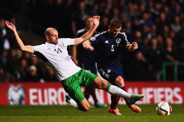GLASGOW, SCOTLAND - NOVEMBER 14:  Darron Gibson of the Republic of Ireland tackles Shaun Maloney of Scotland during the EURO 2016 Group D Qualifier match between Scotland and Republic of Ireland at Celtic Park on November 14, 2014 in Glasgow, Scotland.  (Photo by Laurence Griffiths/Getty Images)