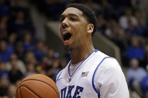 Duke's Jahlil Okafor (15) reacts following a dunk against Army during the second half of an NCAA college basketball game in Durham, N.C., Sunday, Nov. 30, 2014. Duke won 93-73. (AP Photo/Gerry Broome)