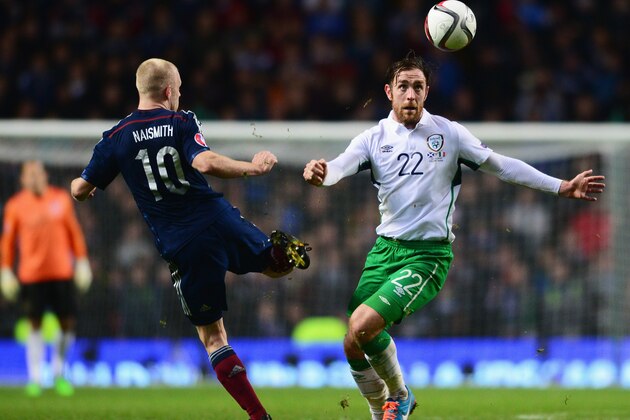GLASGOW, SCOTLAND - NOVEMBER 14:  Richard Keogh of the Republic of Ireland beats Steven Naismith of Scotland to the ball during the EURO 2016 Group D Qualifier match between Scotland and Republic of Ireland at Celtic Park on November 14, 2014 in Glasgow, Scotland.  (Photo by Mark Runnacles/Getty Images)