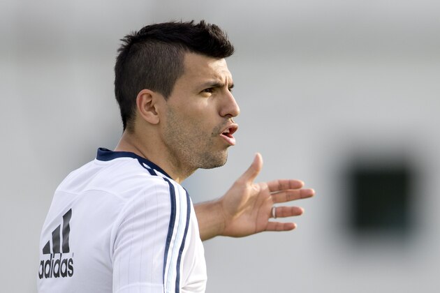 Argentina's Sergio Aguero talks to teammates during a training session in Buenos Aires, Argentina, Monday, June 1, 2015. The Argentina national national team members are training for the Copa America which starts in June in neighboring Chile. (AP Photo/Natacha Pisarenko)
