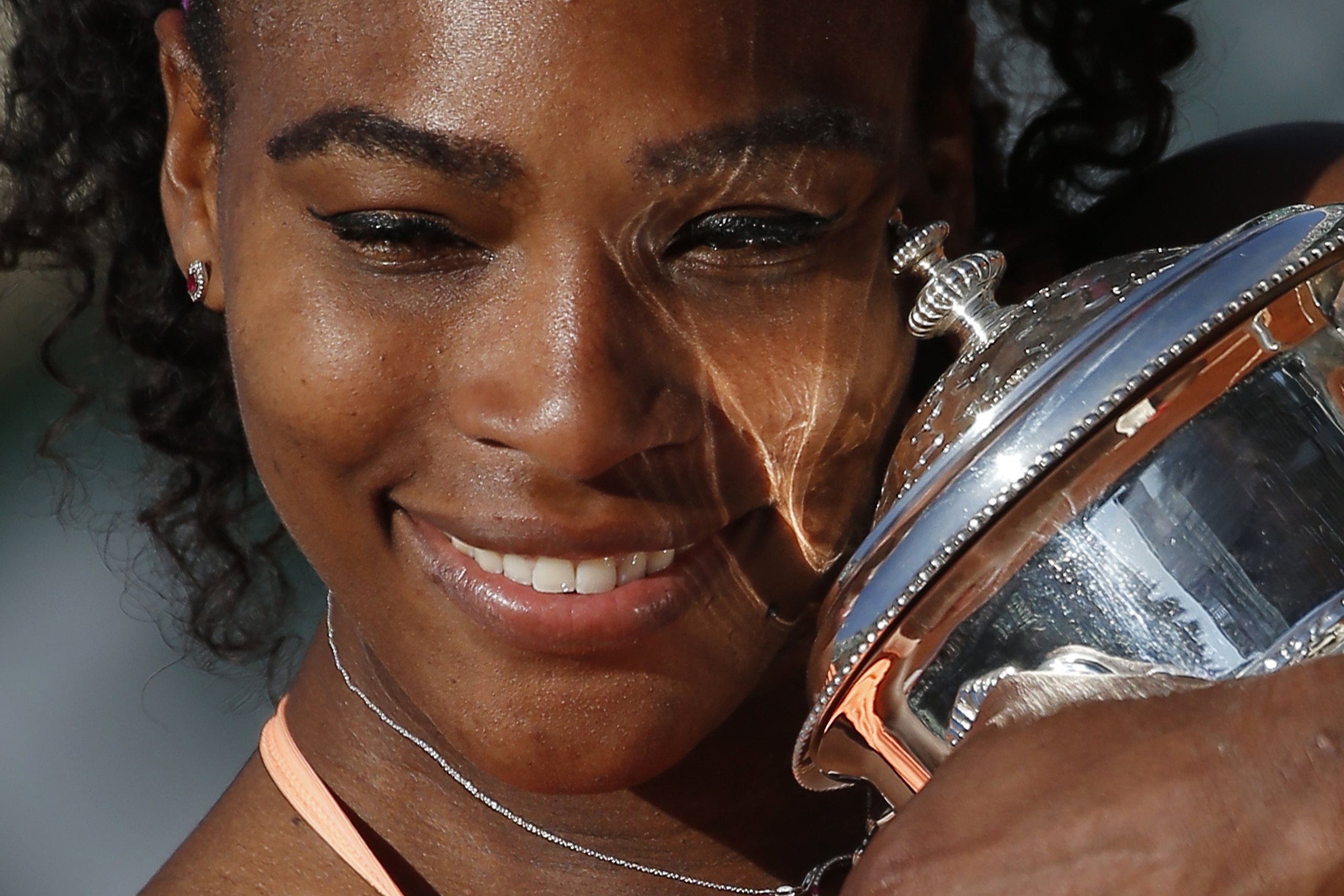 Serena Williams of the U.S. holds the trophy after winning the final of the French Open tennis tournament against Lucie Safarova of the Czech Republic in three sets, 6-3, 6-7, 6-2, at the Roland Garros stadium, in Paris, France, Saturday, June 6, 2015. (AP Photo/Michel Euler) Serena Williams of the U.S. holds the trophy after winning the final of the French Open tennis tournament against Lucie Safarova of the Czech Republic in three sets, 6-3, 6-7, 6-2, at the Roland Garros stadium, in Paris, France, Saturday, June 6, 2015. (AP Photo/Michel Euler)