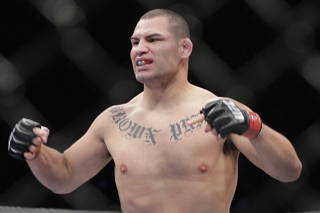 Cain Velasquez reacts after winning the UFC 160 mixed martial arts heavyweight title fight over Antonio Silva, Saturday, May 25, 2013, in Las Vegas. Velasquez won by technical knockout in the first round. (AP Photo/Julie Jacobson)