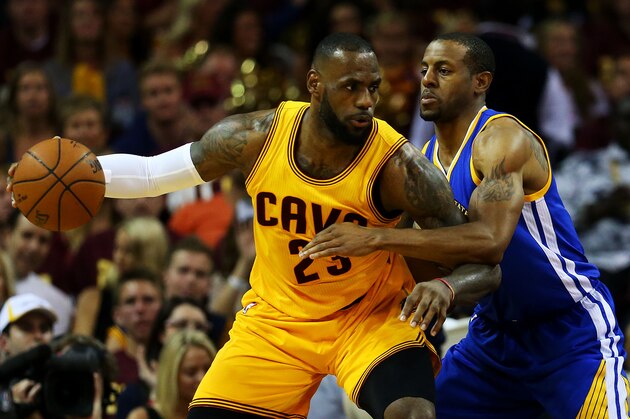 CLEVELAND, OH - JUNE 11:  LeBron James #23 of the Cleveland Cavaliers drives against Andre Iguodala #9 of the Golden State Warriors during Game Four of the 2015 NBA Finals at Quicken Loans Arena on June 11, 2015 in Cleveland, Ohio.  NOTE TO USER: User expressly acknowledges and agrees that, by downloading and or using this photograph, user is consenting to the terms and conditions of Getty Images License Agreement.  (Photo by Ronald Martinez/Getty Images)