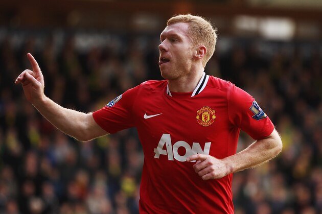 NORWICH, ENGLAND - FEBRUARY 26:  Paul Scholes of Manchester United celebrates scoring during the Barclays Premier League match between Norwich City and Manchester United at Carrow Road on February 26, 2012 in Norwich, England.  (Photo by Bryn Lennon/Getty Images)