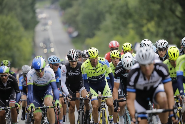 The pack with Switzerland's Fabian Cancellara, center left in black, climbs during the sixth stage of the Tour de France cycling race over 194 kilometers (120.5 miles) with start in Arras and finish in Reims, France, Thursday, July 10, 2014. (AP Photo/Laurent Cipriani) The pack with Switzerland's Fabian Cancellara, center left in black, climbs during the sixth stage of the Tour de France cycling race over 194 kilometers (120.5 miles) with start in Arras and finish in Reims, France, Thursday, July 10, 2014. (AP Photo/Laurent Cipriani)