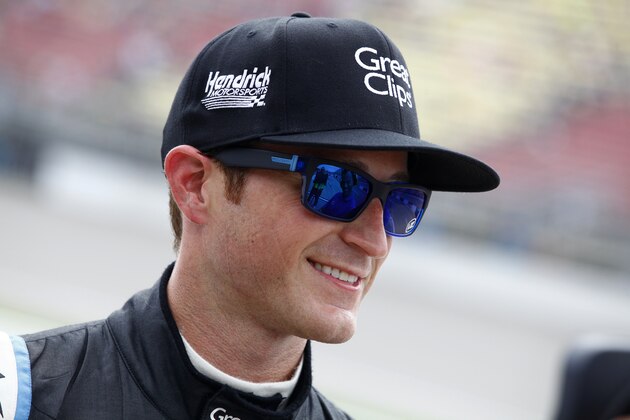BROOKLYN, MI - JUNE 12:  Kasey Kahne, driver of the #5 Great Clips Chevrolet, stands on the grid after qualifying on the pole for the NASCAR Sprint Cup Series Quicken Loans 400 at Michigan International Speedway on June 12, 2015 in Brooklyn, Michigan.  (Photo by Brian Lawdermilk/Getty Images)