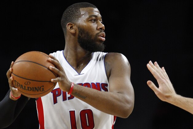 Feb 3, 2015; Auburn Hills, MI, USA; Detroit Pistons forward Greg Monroe (10) looks for an open man during the fourth quarter against the Miami Heat at The Palace of Auburn Hills. Pistons beat the Heat 108-91. Mandatory Credit: Raj Mehta-USA TODAY Sports