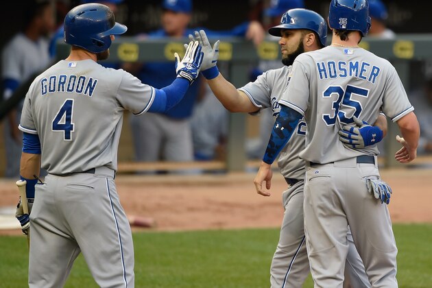 MINNEAPOLIS, MN - JUNE 8: Alex Gordon #4 and Eric Hosmer #35 of the Kansas City Royals congratulate teammate Kendrys Morales #25 after a two-run home run against the Minnesota Twins during the second inning of the game on June 8, 2015 at Target Field in Minneapolis, Minnesota. (Photo by Hannah Foslien/Getty Images)