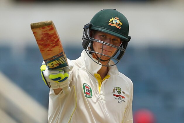 KINGSTON, JAMAICA - JUNE 12: Steve Smith of Australia celebrates after reaching 150 runs  during day two of the Second Test match between Australia and the West Indies at Sabina Park on June 12, 2015 in Kingston, Jamaica.  (Photo by Ryan Pierse/Getty Images)