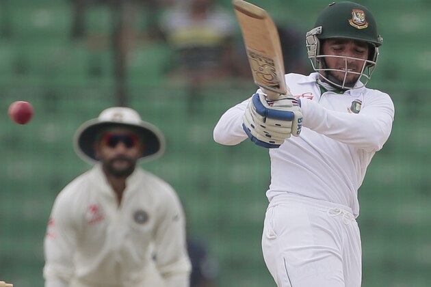 Bangladesh’s Mominul Haque plays a shot during the fourth day of their test cricket match against India in Fatullah, Bangladesh, Saturday, June 13, 2015. (AP Photo/A.M. Ahad)