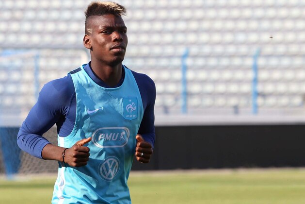 France's Paul Pogba attends a training session in Tirana, Friday June 12, 2015, one day ahead of the friendly match against Albania on Saturday. (AP Photo/Hektor Pustina)