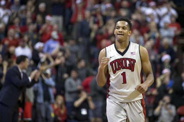 UNLV guard Rashad Vaughn celebrates a 71-67 victory over Arizona after an NCAA college basketball game Tuesday, Dec. 23, 2014, in Las Vegas. (AP Photo/Eric Jamison)