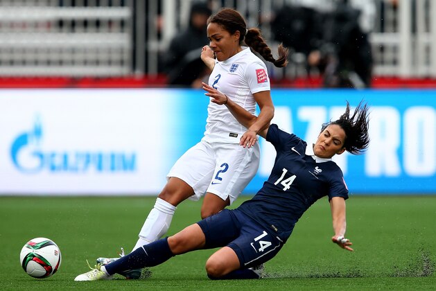 MONCTON, NB - JUNE 09:  Louisa Necib #14 of France knocks the ball away from Alex Scott #2 of England during the FIFA Women's World Cup 2015 Group F match at Moncton Stadium on June 9, 2015 in Moncton, Canada.  (Photo by Elsa/Getty Images)