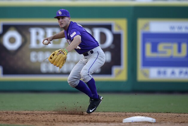 LSU infielder Alex Bregman (8) throws out Louisiana-Lafayette's Joe Robbins  during the third inning of a game at the LSU Super Regional of the NCAA college baseball tournament in Baton Rouge, La., Sunday, June 7, 2015. (AP Photo/Gerald Herbert)
