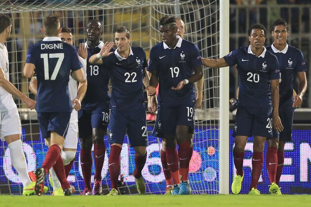 BELGRADE, SERBIA - SEPTEMBER 07: Paul Pogba (C) of France celebrate the goal with the Loic Remy (R) and Morgan Schneiderlin (L) during the International friendly match between Serbia and France at the Stadium JNA on September 07, 2014 in Belgrade, Serbia, 2014. (Photo by Srdjan Stevanovic/Getty Images)