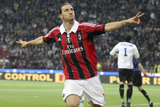 AC Milan forward Zlatan Ibrahimovic, of Sweden, celebrates after scoring during the Serie A soccer match between Inter Milan and AC MIlan at the San Siro stadium in Milan, Italy, Sunday, May 6, 2012. (AP Photo/Antonio Calanni)