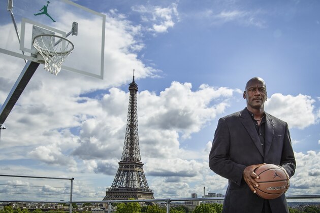 PARIS, FRANCE - JUNE 12: In this handout image provided by Jordan Brand, Michael Jordan paid a visit to Palais 23 this afternoon on Friday June 12, Joined by his frequent partners-in-design Tinker Hatfield and Mark Smith, key figures in the 30-year evolution of the Air Jordan, Jordan has returned to Paris to mark the 30th anniversary of 1985's Air Jordan One. Palais 23 is a spectacular tribute to the shoes, moments, designs and artifacts that have shaped the 30-year evolution of the Air Jordan. (Photo by Jordan Brand via Getty Images)