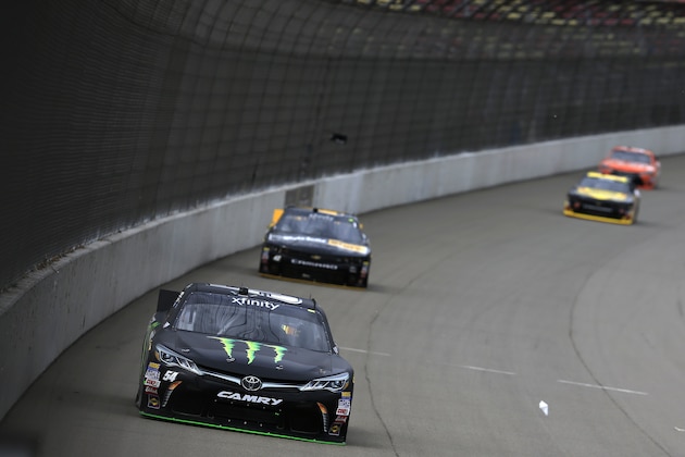 BROOKLYN, MI - JUNE 12:  Kyle Busch, driver of the #54 Monster Energy Toyota, leads a pack of cars during practice for the NASCAR XFINITY Series Great Clips 250 at Michigan International Speedway on June 12, 2015 in Brooklyn, Michigan.  (Photo by Chris Trotman/Getty Images)