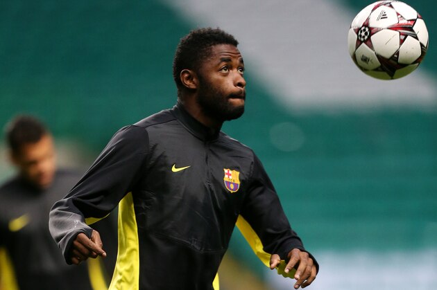 Barcelona's Alex Song control's the ball during their training session at Celtic Park, Glasgow, Scotland, Monday Sept. 30, 2013. Barcelona will play Celtic in a Champions League Group H soccer match on Tuesday. (AP Photo/Scott Heppell)