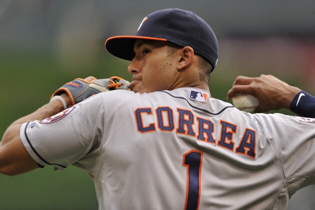 Houston Astros' Carlos Correa throws before a baseball game against the Chicago White Sox Monday, June 8, 2015 in Chicago. (AP Photo/Paul Beaty)