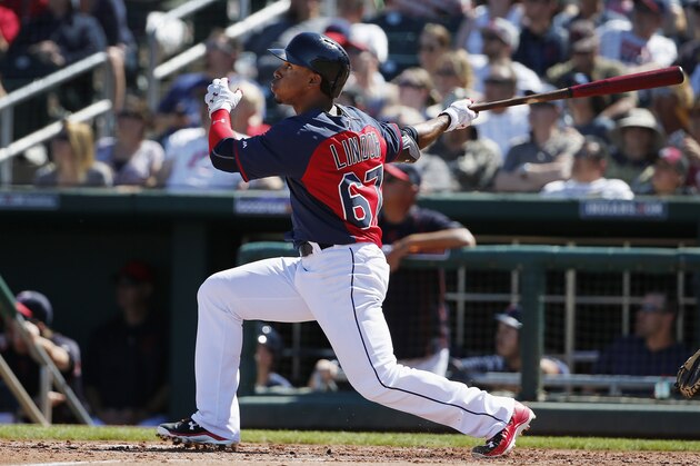 Cleveland Indians' Francisco Lindor connects for his inside-the-park home run against the San Diego Padres during the third inning of a spring training baseball game, Sunday, March 15, 2015, in Goodyear, Ariz. (AP Photo/Ross D. Franklin)