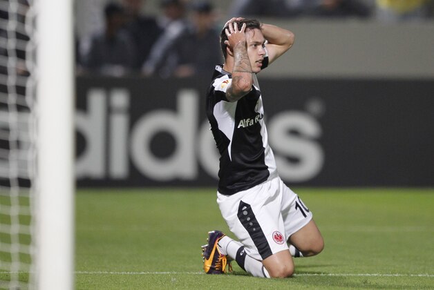 Eintracht Frankfurt's Vaclav Kadlec holds his head during the Europa League group F soccer match against Maccabi Tel Aviv in Bloomfield stadium in Tel Aviv, Israel, Thursday, Nov. 7, 2013. Maccabi won 4-2. (AP Photo / Ariel Schalit)