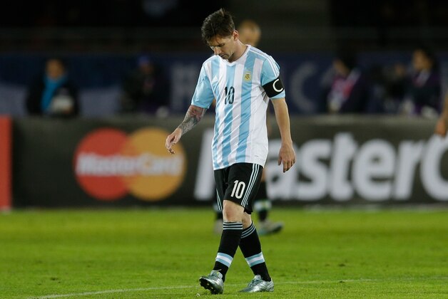 Argentina's Lionel Messi reacts after Paraguay's Lucas Barrios, unseen, scored a goal during a Copa America Group B soccer match at La Portada stadium in La Serena, Chile, Saturday, June 13, 2015. (AP Photo/Natacha Pisarenko) Argentina's Lionel Messi reacts after Paraguay's Lucas Barrios, unseen, scored a goal during a Copa America Group B soccer match at La Portada stadium in La Serena, Chile, Saturday, June 13, 2015. (AP Photo/Natacha Pisarenko)