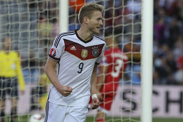 Germany’s Andre Schurrle reacts after scoring the opening goal during the Group D, Euro 2016 qualifying soccer match between Gibraltar and Germany at the Algarve stadium, outside Faro, southern Portugal, Saturday, June 13, 2015. (AP Photo/Francisco Seco)