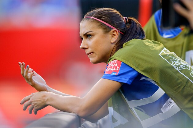 WINNIPEG, MB - JUNE 12:  Alex Morgan #13 of the United States reacts from the sideline in the second half while taking on Sweden in the FIFA Women's World Cup Canada 2015 match at Winnipeg Stadium on June 12, 2015 in Winnipeg, Canada.  (Photo by Kevin C. Cox/Getty Images)