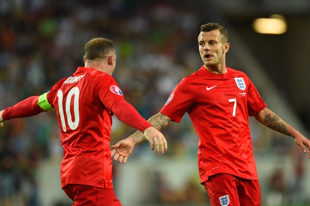 LJUBLJANA, SLOVENIA - JUNE 14:  Jack Wilshere of England (R) celebrates scoring their first goal with Wayne Rooney of England during the UEFA EURO 2016 Qualifier between Slovenia and England on at the Stozice Arena on June 14, 2015 in Ljubljana, Slovenia.  (Photo by Stu Forster/Getty Images)