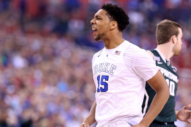 INDIANAPOLIS, IN - APRIL 04: Jahlil Okafor #15 of the Duke Blue Devils reacts after a play in the first half against the Michigan State Spartans during the NCAA Men's Final Four Semifinal at Lucas Oil Stadium on April 4, 2015 in Indianapolis, Indiana.  (Photo by Andy Lyons/Getty Images)