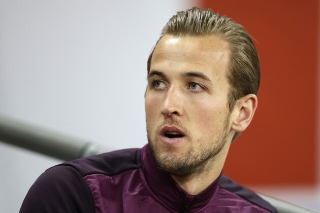 England's Harry Kane sits on the bench at the beginning of the Euro 2016 Group E qualifying soccer match between England and Lithuania at Wembley Stadium in London, Friday, March 27, 2015. (AP Photo/Matt Dunham)