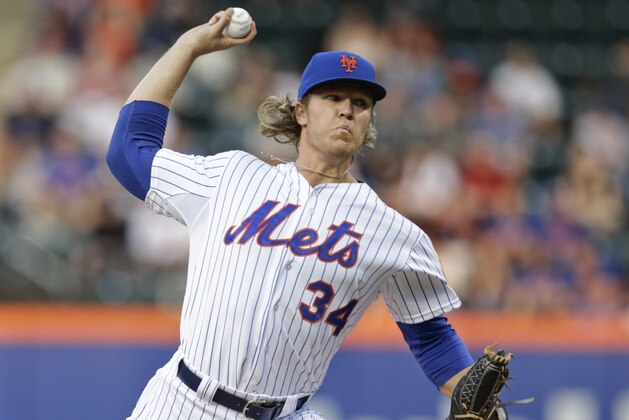 New York Mets' Noah Syndergaard delivers a pitch during the first inning of a baseball game against the San Francisco Giants on Tuesday, June 9, 2015, in New York. (AP Photo/Frank Franklin II)