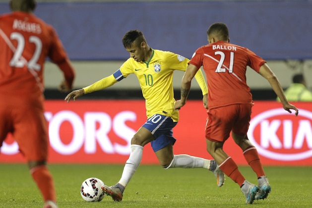 Brazil's Neymar controls the ball past Peru's Josepmir Ballon  during a Copa America Group C soccer match at the Bicentenario Germ·n Becker stadium in Temuco, Chile, Sunday, June 14, 2015. (AP Photo/Jorge Saenz)
