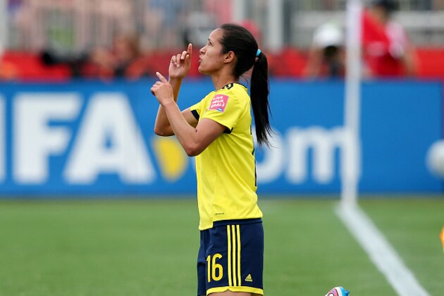 MONCTON, NB - JUNE 13:  Lady Andrade #16 of Colombia celebrates her goal in the first half against France during the FIFA Women's World Cup 2015 Group F match at Moncton Stadium on June 13, 2015 in Moncton, Canada.  (Photo by Elsa/Getty Images)