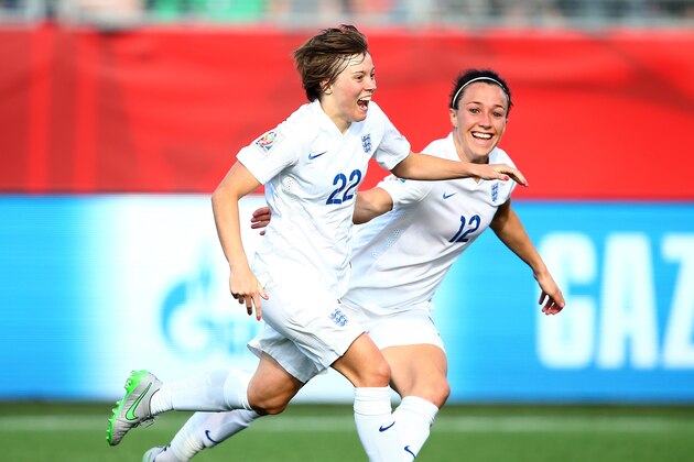 MONCTON, NB - JUNE 13:  Fran Kirby #22 of England celebrates her goal with teammate Lucy Bronze #12 in the second half against Mexico during the FIFA Women's World Cup 2015 Group F match at Moncton Stadium on June 13, 2015 in Moncton, Canada.  (Photo by Elsa/Getty Images)