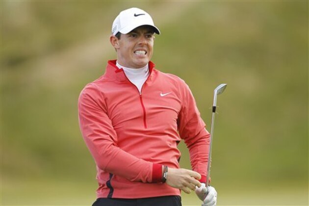 Northern Ireland's Rory McIlroy after playing his second shot on hole 9 during round one of the Irish Open Golf Championship at Royal County Down, Newcastle, Northern Ireland, Thursday, May 28, 2015.  (AP Photo/Peter Morrison)