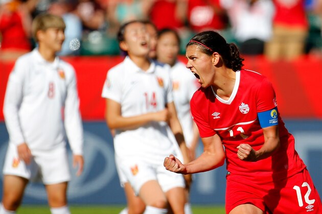 EDMONTON, AB - JUNE 06:  Christine Sinclair #12 of Canada reacts after scoring the go-ahead goal on a penalty kick in the final minutes against China during the FIFA Women's World Cup Canada 2015 Group A match between Canada and China PR at Commonwealth Stadium on June 6, 2015 in Edmonton, Canada.  (Photo by Kevin C. Cox/Getty Images)