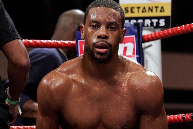 LONDON, ENGLAND - JANUARY 12:   Anthony Small takes a break during the fight for the vacant Southern Area Light Middleweight title against Takaloo on January 12, 2008 at York Hall, London, England. (Photo by John Gichigi/Getty Images)