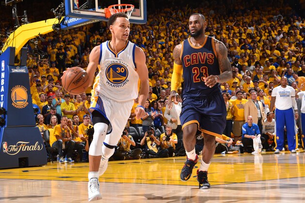 OAKLAND,CA - JUNE 14:  Stephen Curry #30 of the Golden State Warriors dribbles up court against the Cleveland Cavaliers at the Oracle Arena During Game Five of the 2015 NBA Finals on June 14, 2015 in Oakland, California NOTE TO USER: User expressly acknowledges and agrees that, by downloading and/or using this Photograph, user is consenting to the terms and conditions of the Getty Images License Agreement. Mandatory Copyright Notice: Copyright 2015 NBAE (Photo by Jesse D. Garrabrant/NBAE via Getty Images)
