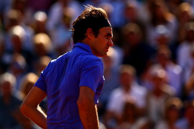 PARIS, FRANCE - JUNE 02:  Roger Federer of Switzerland looks on during his Men's quarter final match against Stanislas Wawrinka of Switzerland on day of the 2015 French Open at Roland Garros on June 2, 2015 in Paris, France.  (Photo by Dan Istitene/Getty Images)